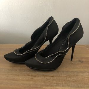 Report Signature Watts Ruffle Zipper Pumps